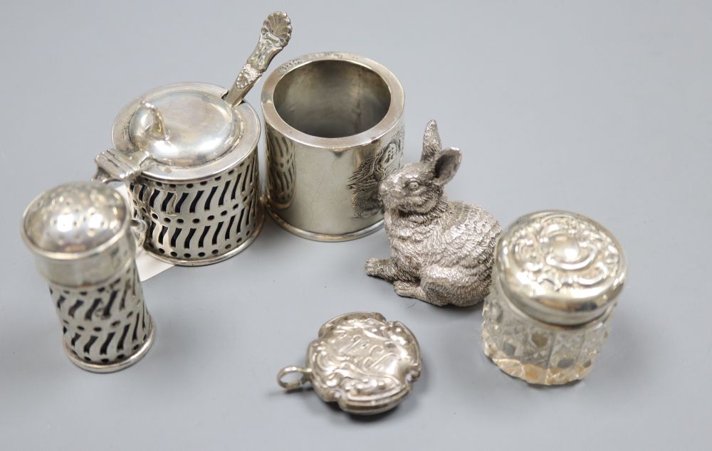 Small silver including a filled miniature silver model rabbit, two silver condiments and three other items,